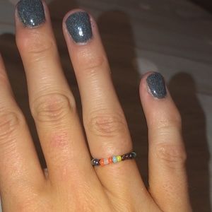 Minimilast Multi-color beaded ring.